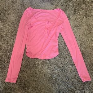 Pink ribbed long sleeve with a half button up